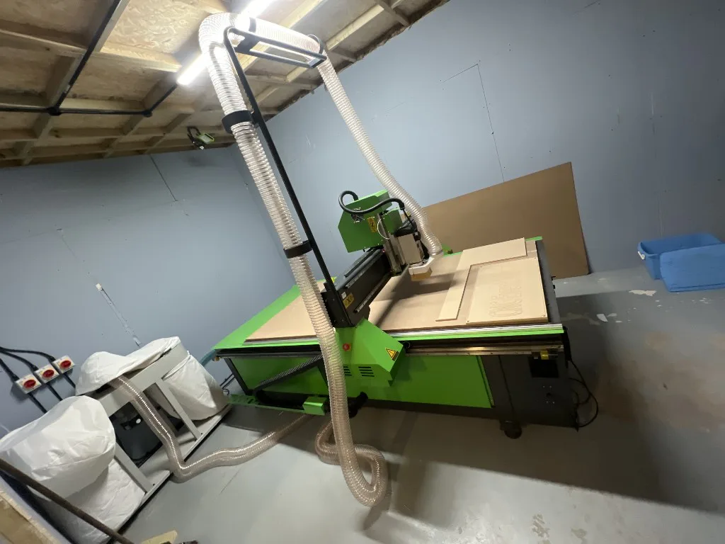 Spartan 1325 CNC Router and extraction system installed at Illumination Event Ltd