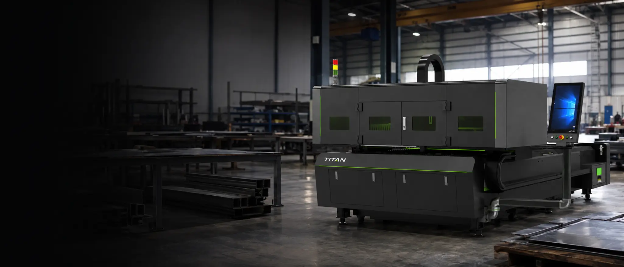 Titan N3015 flatbed fibre laser supplied and installed in a UK fabrication workshop — open-bed 3000 × 1500 mm platform with enclosed gantry